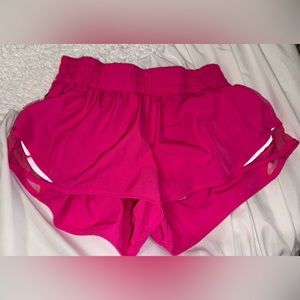 Lululemon sonic pink look alike size medium (8). Has the logo and everything.